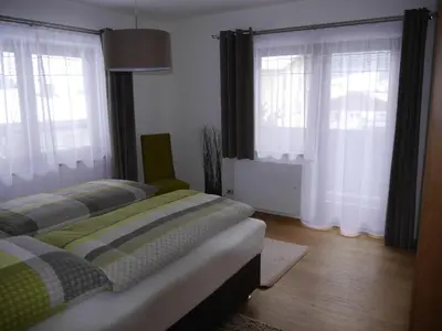 Ein Bett oder Betten in einem Zimmer der Unterkunft Ferienwohnung Enn