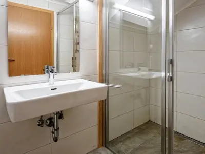 Ein Badezimmer in der Unterkunft Haus Filzstein