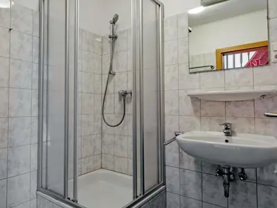 Ein Badezimmer in der Unterkunft Haus Filzstein