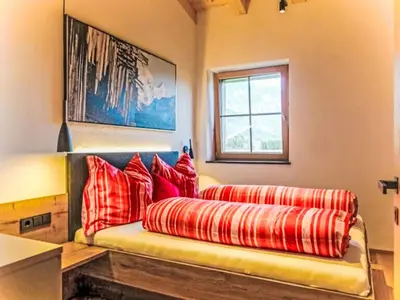 Ein Bett oder Betten in einem Zimmer der Unterkunft Apartment Das Panoramal by Interhome