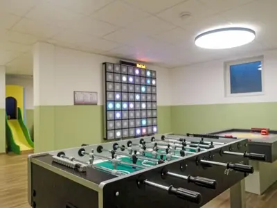 Eine Spielezimmer in der Unterkunft Apartment Das Panoramal by Interhome