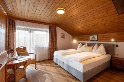 Ein Bett oder Betten in einem Zimmer der Unterkunft Gästehaus Kopp