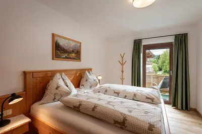 Ein Bett oder Betten in einem Zimmer der Unterkunft Haus Alexandra