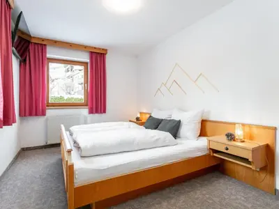 Ein Bett oder Betten in einem Zimmer der Unterkunft Apart An der Ache