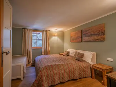 Ein Bett oder Betten in einem Zimmer der Unterkunft Bichlnwiesn
