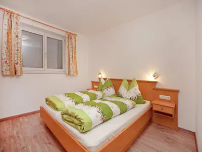 Ein Bett oder Betten in einem Zimmer der Unterkunft Flat in Mittersill near Ski Lift