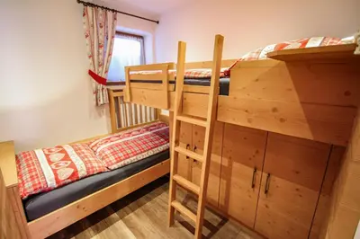 Ein Bett oder Betten in einem Zimmer der Unterkunft Hochkrimml 51 - Top EG