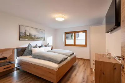 Ein Bett oder Betten in einem Zimmer der Unterkunft Ferienwohnung Bruneiden
