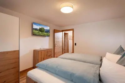 Ein Bett oder Betten in einem Zimmer der Unterkunft Ferienwohnung Bruneiden