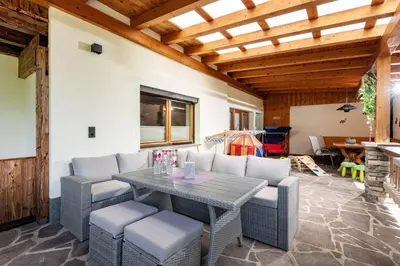 Ein Sitzbereich in der Unterkunft Ferienwohnung Bruneiden