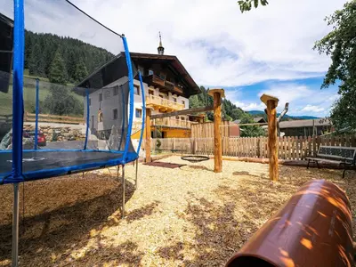 Ein Kinderspielbereich in der Unterkunft Farmhouse in Bramberg with Natural Pond