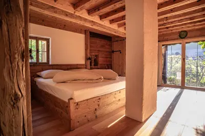 Ein Bett oder Betten in einem Zimmer der Unterkunft Hunters Lodge Chalet Superior