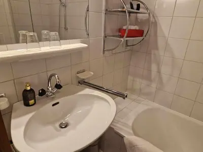 Ein Badezimmer in der Unterkunft Pension Alpenrose