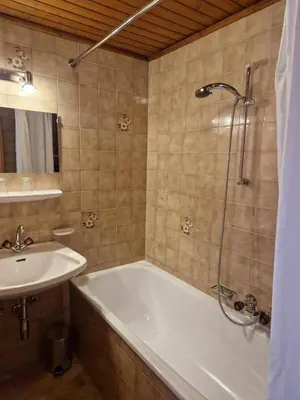Ein Badezimmer in der Unterkunft Pension Alpenrose