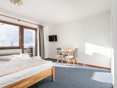 Ein Bett oder Betten in einem Zimmer der Unterkunft Brixen Alpin Living Top 1 und 2 und 3