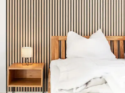 Ein Bett oder Betten in einem Zimmer der Unterkunft Brixen Alpin Living Top 1 und 2 und 3