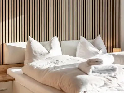 Ein Bett oder Betten in einem Zimmer der Unterkunft Brixen Alpin Living Top 15