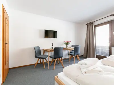 Ein Bett oder Betten in einem Zimmer der Unterkunft Brixen Alpin Living Top 13