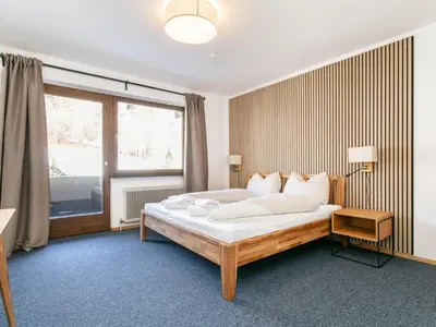 Ein Bett oder Betten in einem Zimmer der Unterkunft Brixen Alpin Living Top 7