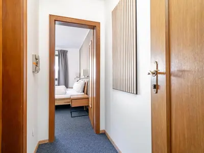 Ein Bett oder Betten in einem Zimmer der Unterkunft Brixen Alpin Living Top 7