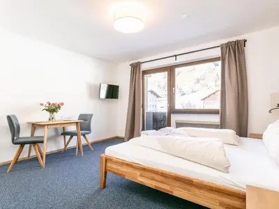 Ein Bett oder Betten in einem Zimmer der Unterkunft Brixen Alpin Living Top 7
