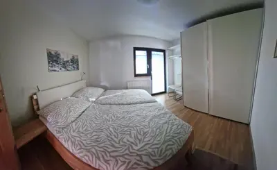 Ein Bett oder Betten in einem Zimmer der Unterkunft Saal life Apartment