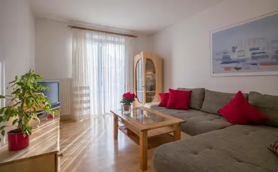 Ein Sitzbereich in der Unterkunft Apartment Haus Janine