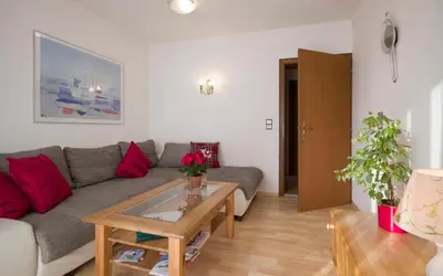 Ein Sitzbereich in der Unterkunft Apartment Haus Janine
