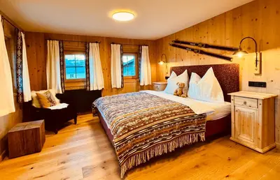 Ein Bett oder Betten in einem Zimmer der Unterkunft ALPIN CHARME APARTMENTS 3 x Boutique Alpine Living