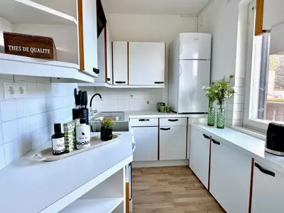 Küche/Küchenzeile in der Unterkunft SPOTLIGHT 4YOU City Apartment with parking by belle-stay