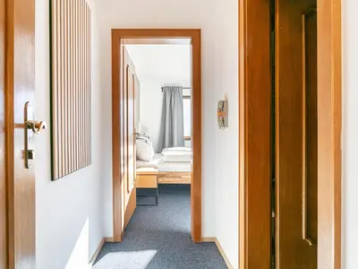 Ein Bett oder Betten in einem Zimmer der Unterkunft Brixen Alpin Living Top 11