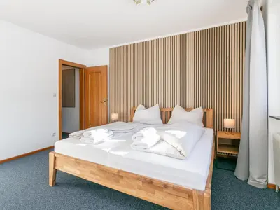 Ein Bett oder Betten in einem Zimmer der Unterkunft Brixen Alpin Living Top 3