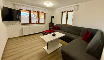 Ein Sitzbereich in der Unterkunft Apartment Baumann - Wildschönau Premium Card im Sommer inklusive!