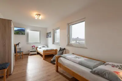 Ein Bett oder Betten in einem Zimmer der Unterkunft Villa Werlberger