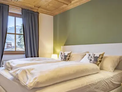 Ein Bett oder Betten in einem Zimmer der Unterkunft Kitz Hills Chalet Mondschein