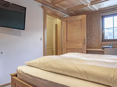 Ein Bett oder Betten in einem Zimmer der Unterkunft Kitz Hills Chalet Mondschein