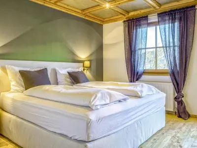 Ein Bett oder Betten in einem Zimmer der Unterkunft Kitz Hills Chalet Mondschein