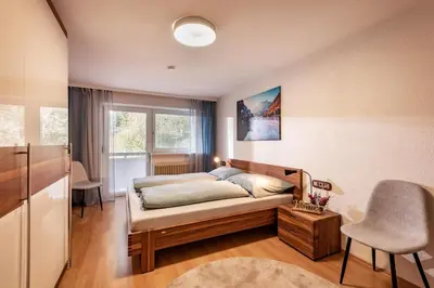 Ein Bett oder Betten in einem Zimmer der Unterkunft Ferienwohnung Pulverer