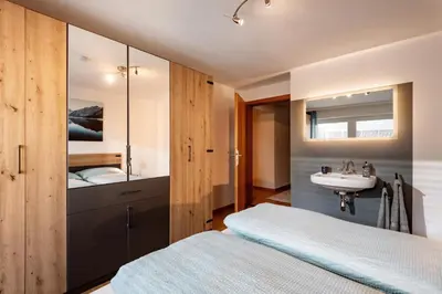 Ein Bett oder Betten in einem Zimmer der Unterkunft Ferienwohnung Pulverer