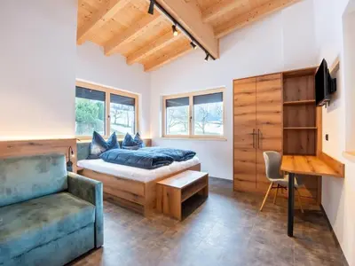 Ein Bett oder Betten in einem Zimmer der Unterkunft Apartment Moiklerhof