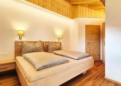 Ein Bett oder Betten in einem Zimmer der Unterkunft Almliesl WILD-728