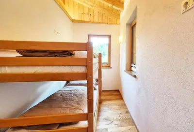 Ein Bett oder Betten in einem Zimmer der Unterkunft Almliesl WILD-728