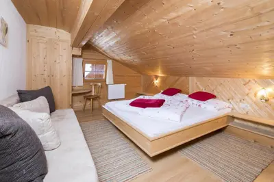 Ein Bett oder Betten in einem Zimmer der Unterkunft Außer Roßmoos