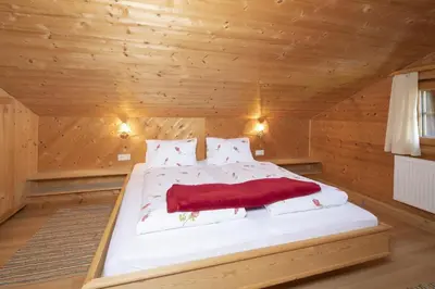 Ein Bett oder Betten in einem Zimmer der Unterkunft Außer Roßmoos