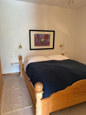 Ein Bett oder Betten in einem Zimmer der Unterkunft Bergblick