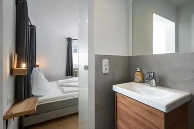 Ein Bett oder Betten in einem Zimmer der Unterkunft Appartement Alpenzauber