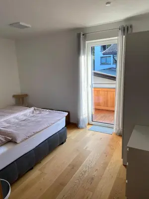 Ein Bett oder Betten in einem Zimmer der Unterkunft Haus Kaiserblick Top 2