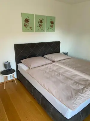 Ein Bett oder Betten in einem Zimmer der Unterkunft Haus Kaiserblick Top 2