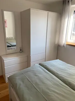 Ein Bett oder Betten in einem Zimmer der Unterkunft Haus Kaiserblick Top 2