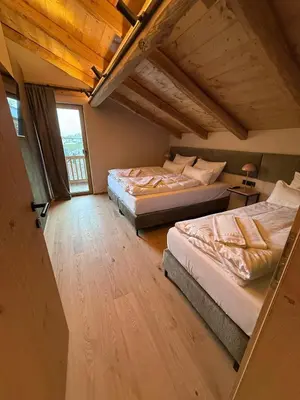 Ein Bett oder Betten in einem Zimmer der Unterkunft GOLDMARIE - Apartments
